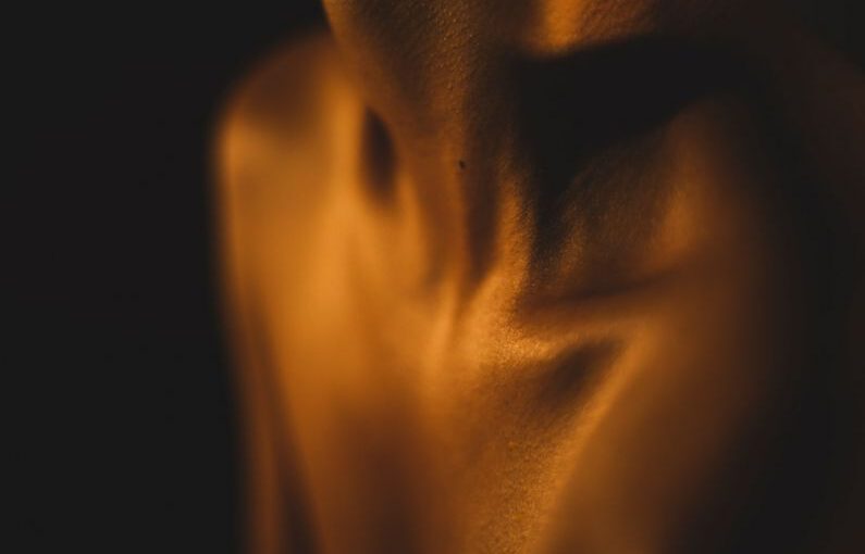 Interview Body Language - a blurry photo of a person's torso