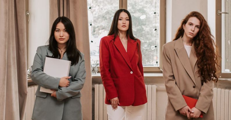 Women Leadership - Three Women in Business Attires Inside an Office