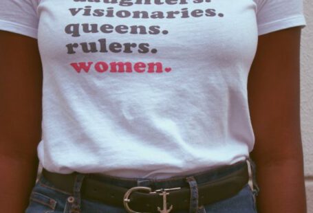 Women Empowerment - Woman Wearing White T-shirt and Blue Denim Bottoms