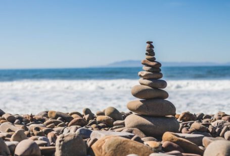 Work Life Balance - stack rock on seashore