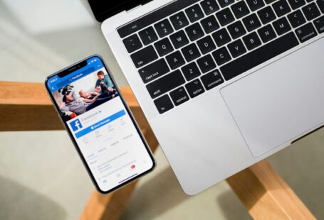 Social Media Strategy - iPhone X beside MacBook